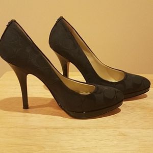 Coach High Heel black pumps.